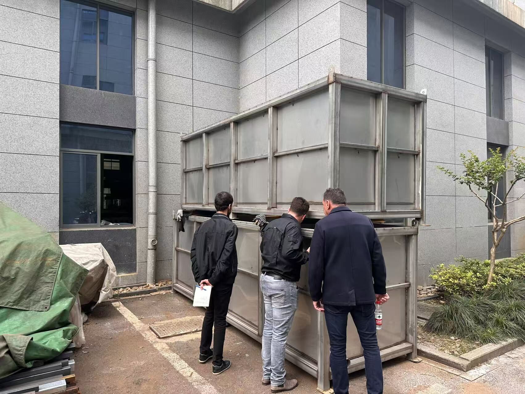 customers inspect powder coat line